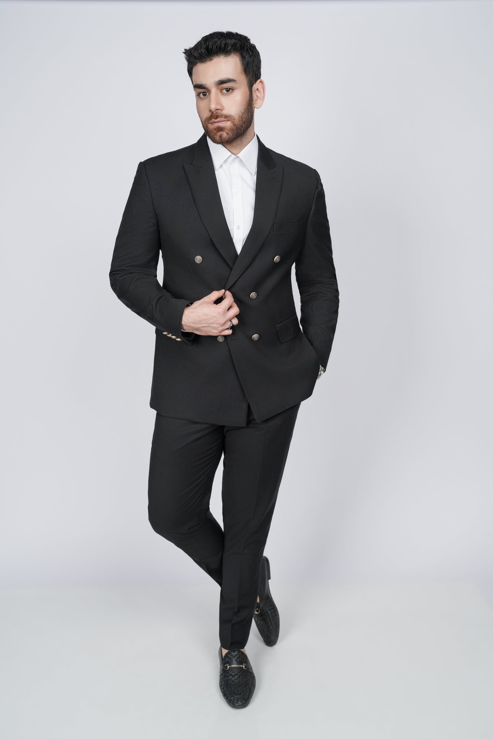 Solid black six button two piece suit