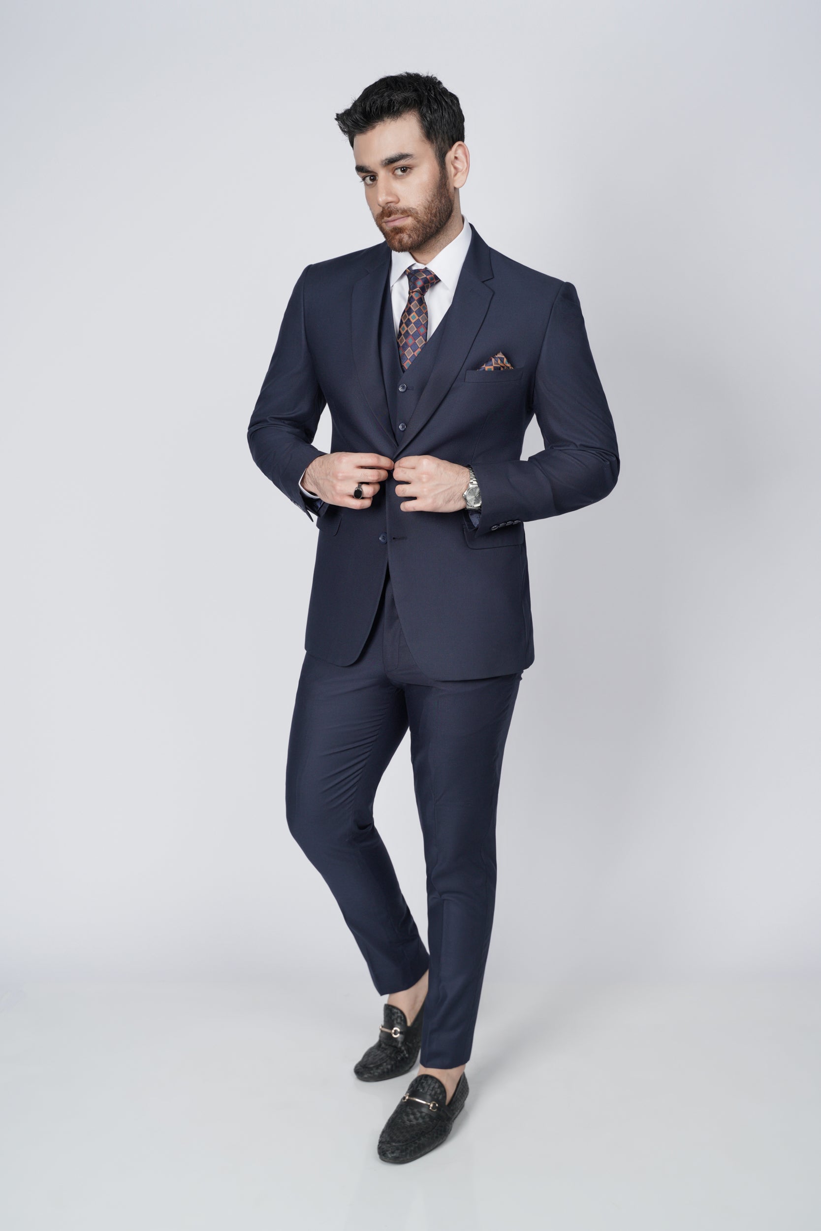 Navy blue three piece suit