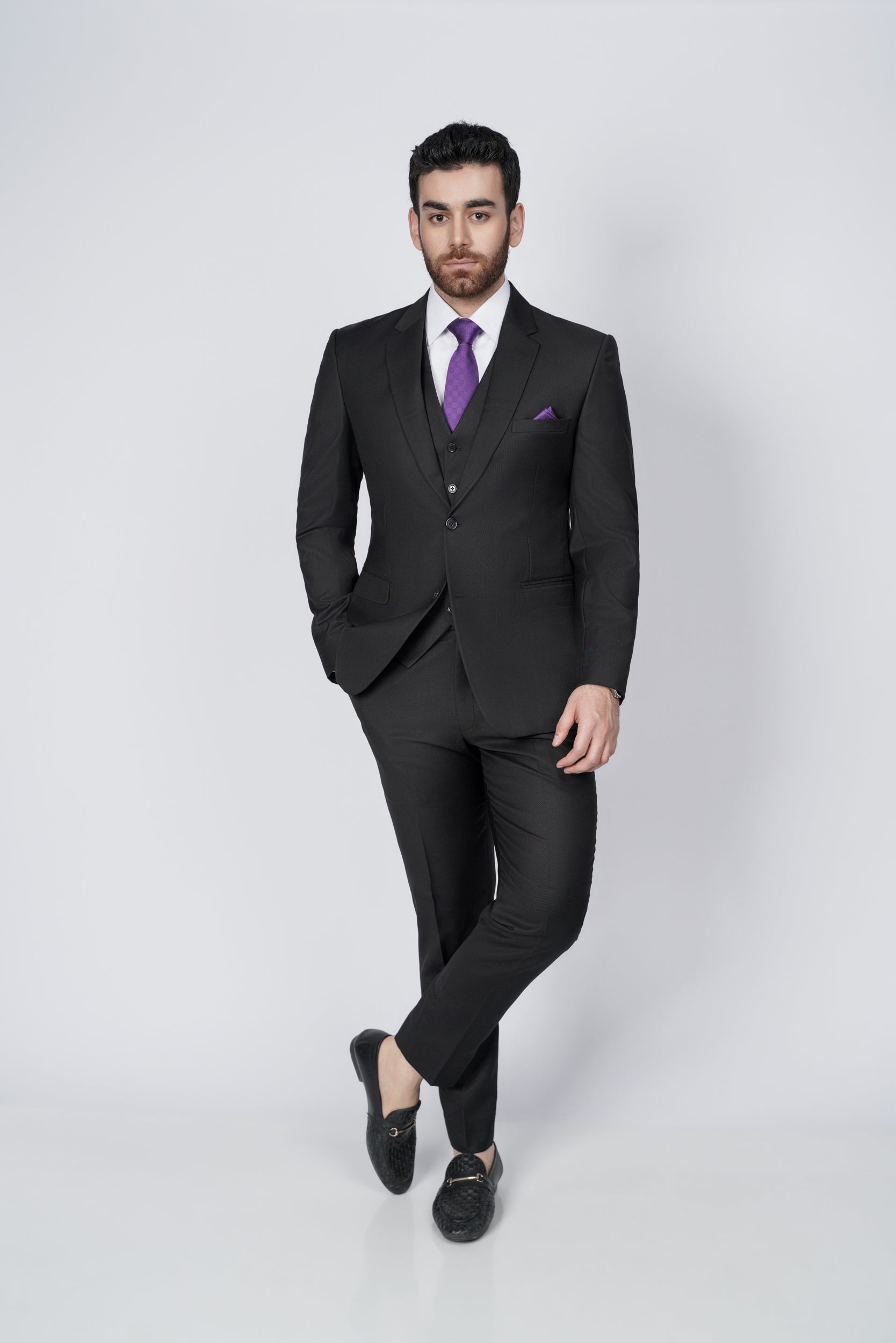 Solid black three piece suit