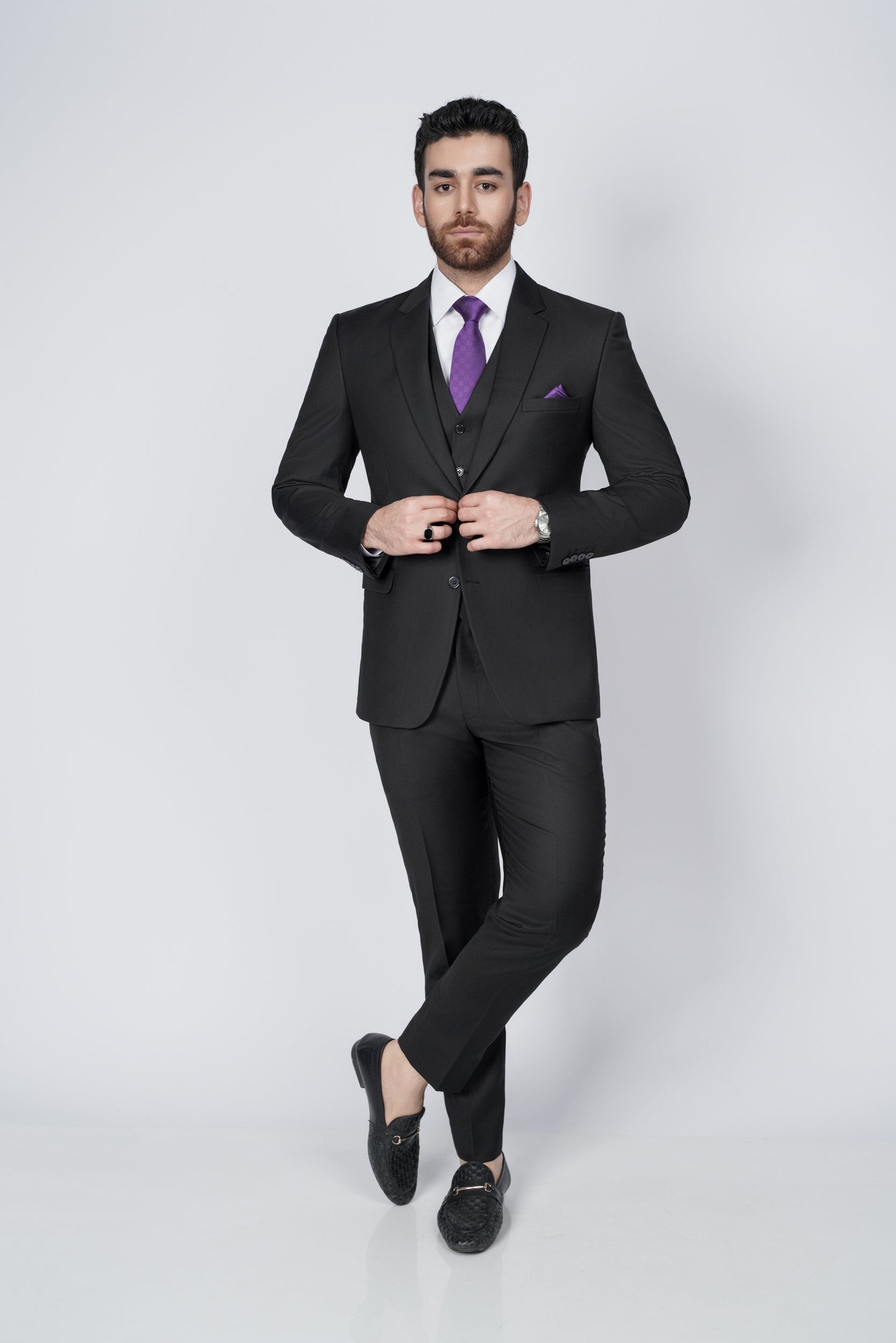 Solid black three piece suit