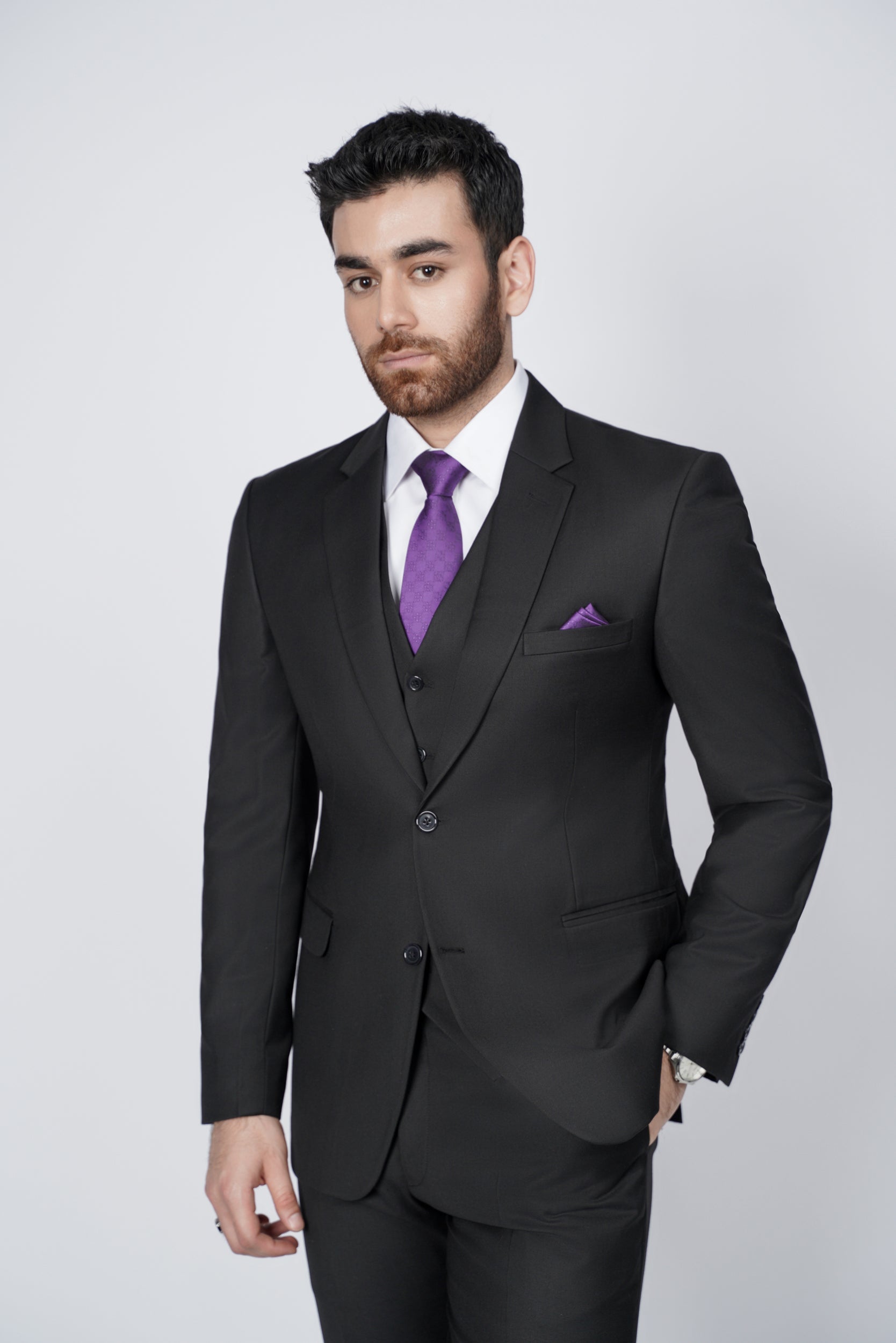 Solid black three piece suit