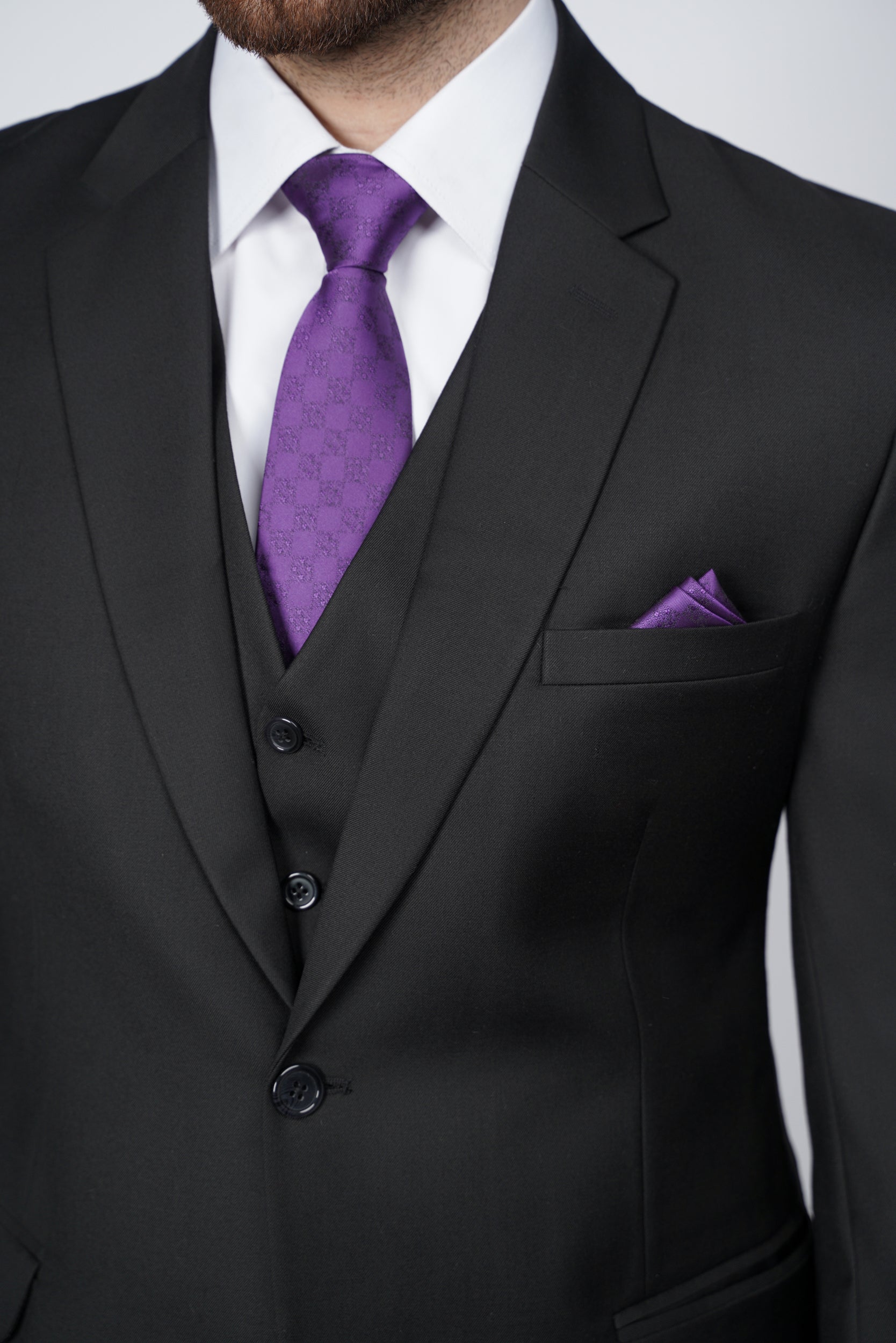 Solid black three piece suit